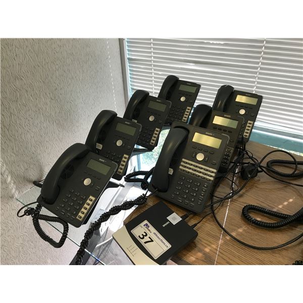 LOT OF 7 SNOM 7 SERIES VOIP PHONE HAND SETS AND ONE SNOM GATEWAY