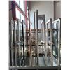 Image 2 : 2 COMMERCIAL DOORS, 1 ALUMINUM FRAME AND GLASS DOOR WITH STAINLESS STEEL PULL BAR HANDLE AND 1