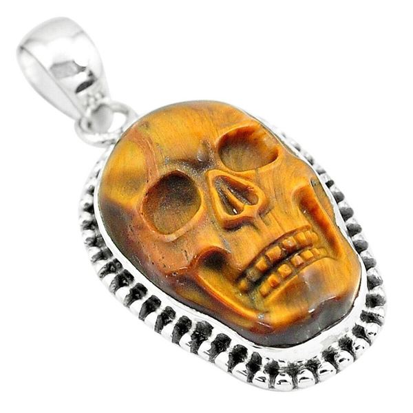 16.43cts Carved Tigers Eye Skull Sterling Silver Pendant