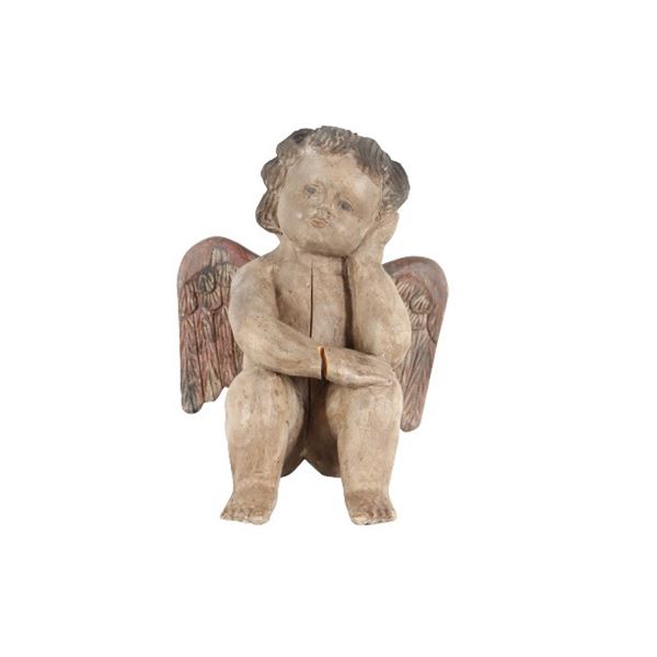Hand-Carved Seated Cherub Figure