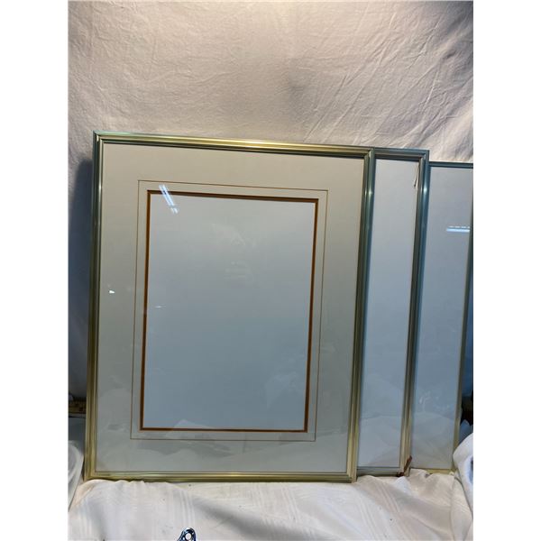 3 frames one has crack in the glass