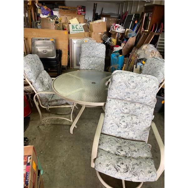 Patio table and 5 chairs two chars are swivel