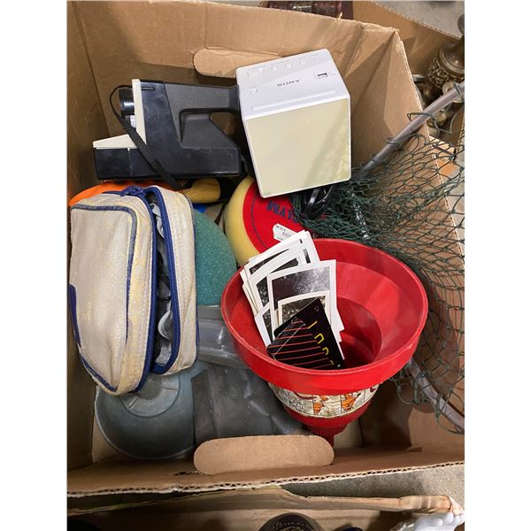 Box of cameras fish net, ect.