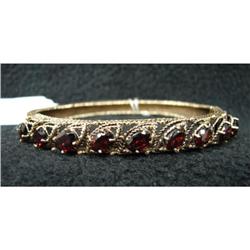 14K GOLD BRACELET WITH GARNETS