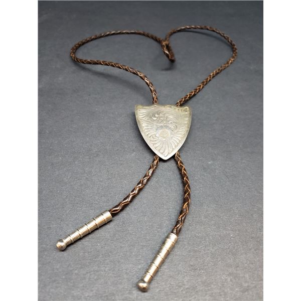 INTRICATE STERLING SILVER AND LEATHER BOLLO