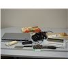 Image 1 : DVD Player, Headphones, Cords, Pipe Wrench, Small Meat Cleaver and Vacuum Sealer