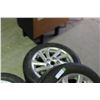 Image 3 : 3 Used Tires on Rims