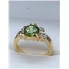 Image 1 : Ladies 14K G.P. Peridot Solitaire Style Gemstone ring with side CZ stones