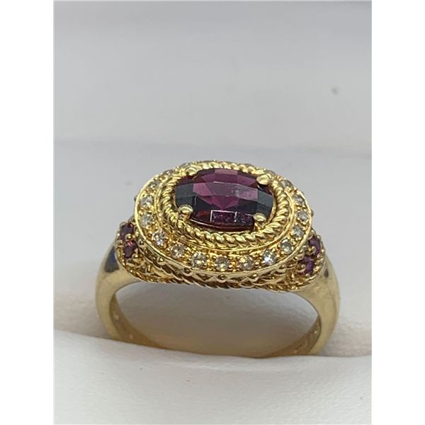 Gents 10 K Gold 1.32 Carat Round Cut Oval Garnet Solitaire with side diamonds - appraised $ 5800.00
