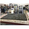 Image 1 : Black Area Rug (5ft 3in x 7ft 5in)