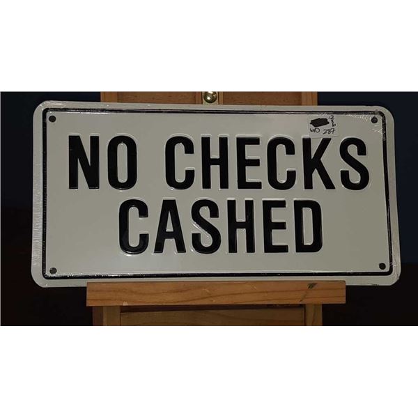 12 inch by 6 inch no checks cashed new metal sign