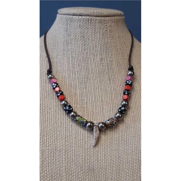 Beaded necklace on 25 in leather strand