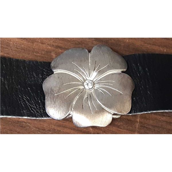 Large metal foxy flower on 8 inch by 1.5 inch leather strap