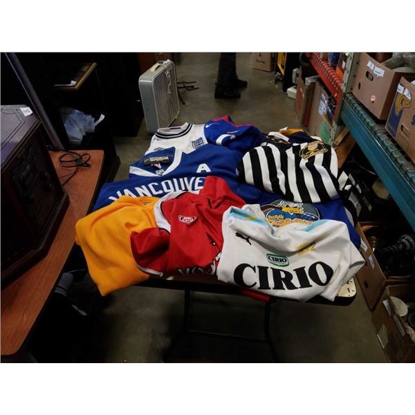 LOT OF SPORTS JERSEYS, INCLUDES CANUCKS AND DONALD DUCK