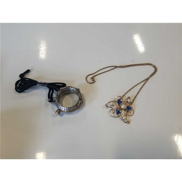 CHAIN AND PENDENT MARKED 12K GOLD AND AQUITAINE LAUREL LEAF SHEPHARDS RING PEWTER SUNDIAL RING