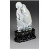 CHINESE CARVED JADE HARDSTONE CARP AMID WAVES