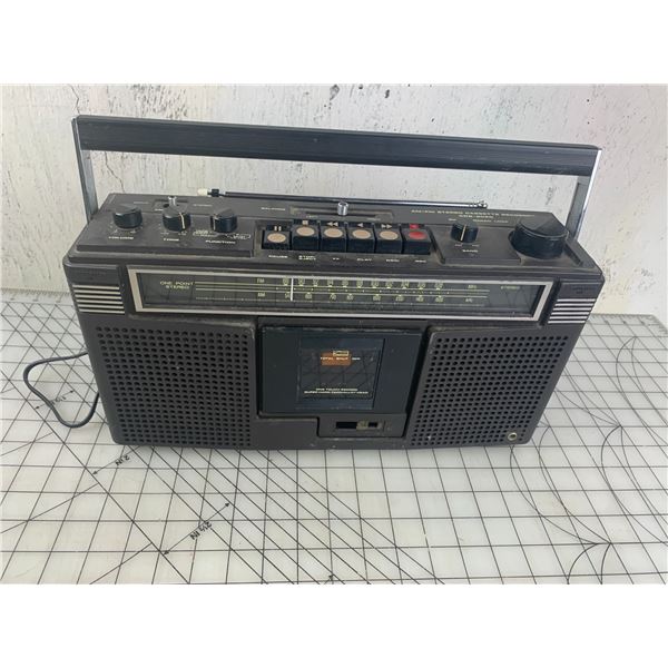 VINTAGE STEREO CASSETTE RECORDER POWERS ON