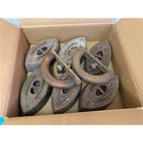 LOT OF ANTIQUE SAD IRONS AND HANDLES