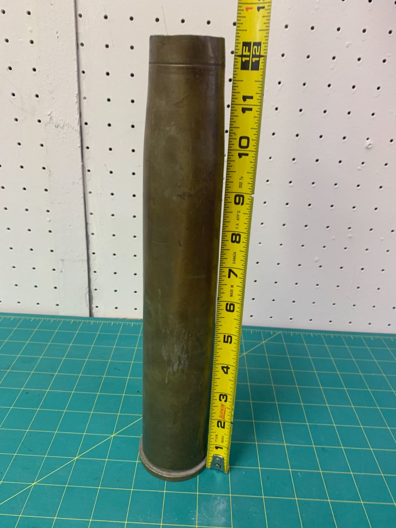 LARGE BRASS SHELL CASING 1954
