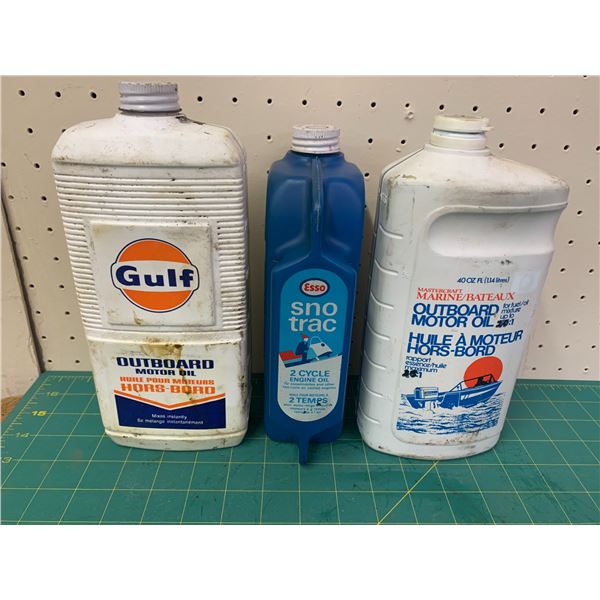 LOT OF VINTAGE OUTBOARD SNOWMOBILE OIL JUGS