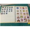 Image 3 : PHOTO ALBUM OF APPROX 200 VINTAGE STICKERS SMURFS GARFIELD SCRATCH AND SNIFF GREMLINS AND MORE