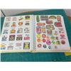 Image 5 : PHOTO ALBUM OF APPROX 200 VINTAGE STICKERS SMURFS GARFIELD SCRATCH AND SNIFF GREMLINS AND MORE