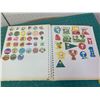 Image 9 : PHOTO ALBUM OF APPROX 200 VINTAGE STICKERS SMURFS GARFIELD SCRATCH AND SNIFF GREMLINS AND MORE