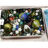 Image 2 : tin full of marbles