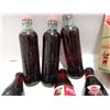Image 2 : 6 full collectible Coca-Cola bottles with case