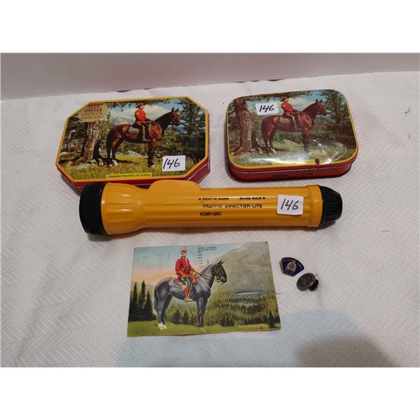 2 RCMP tins, flash light, post card & buttons
