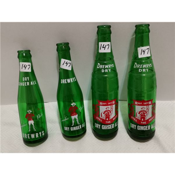 4 Drewry's Dry bottles, RCMP logos