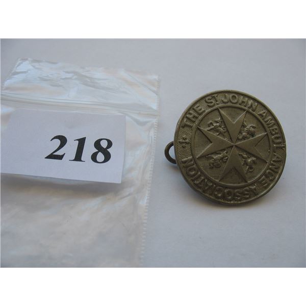 THE ST. JOHN AMBULANCE ASSOCIATION BADGE