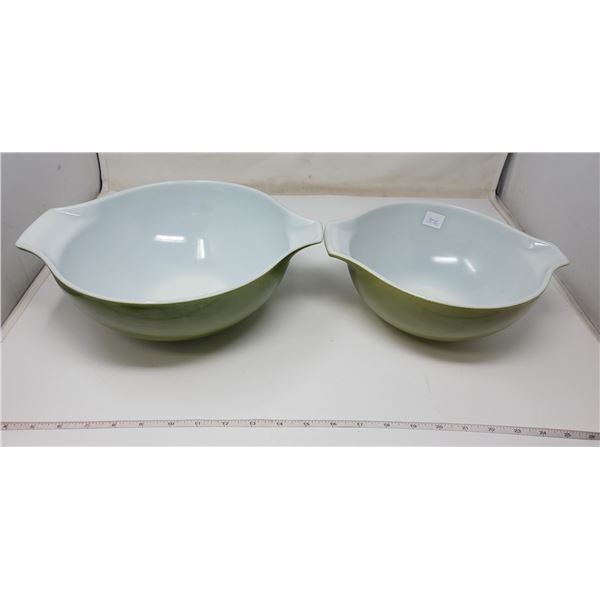 2 green Pyrex bowls