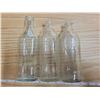 Image 2 : Two 8oz glass baby bottles, One Scott's emulsion cod liver oil glass bottle