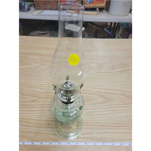 Small green coal oil lamp with chimney