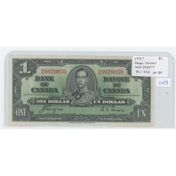 1937 $1. Bank of Canada. Coyne-Towers signatures. W/M Prefix. DC-21d. VF-30. Nice.