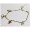 Image 1 : 10 KT CHARM BRACELET WITH CHARMS