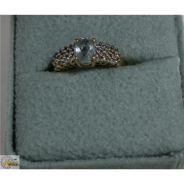 10 KT AQUAMARINE & 24 DIAMOND CLUSTER RING