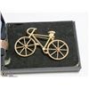 Image 1 : A GOLD TONE VINTAGE BICYCLE BROOCH