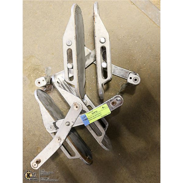 2 GYPROCK OR DRYWALL CARRYING HAND TOOLS.
