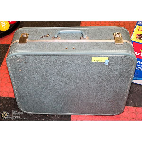 VINTAGE BLUE TRAVELGARD HARD COVER SUIT CASE