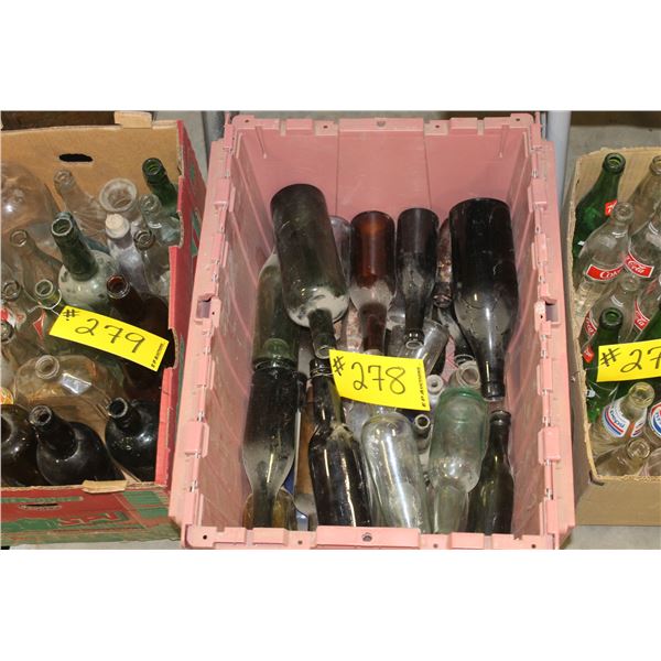 PINK CRATE FULL OF BOTTLES