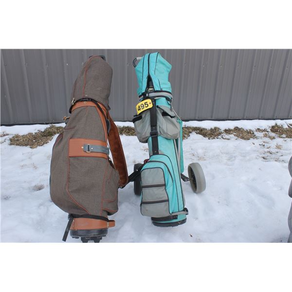 TWO GOLD HAND WALKING CARTS WITH CLUBS