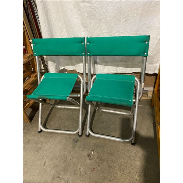 2 folding camp chairs or stools