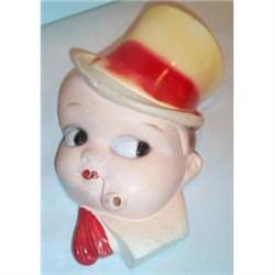 Man with Red Hat and Pipe String Holder #1677924