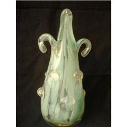 GREEN GLASS VASE , OPENING FLOWER #1694971