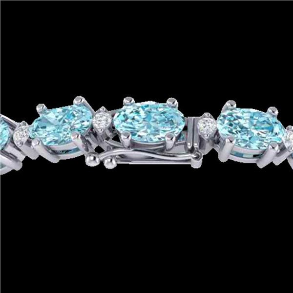 25.8 ctw Sky Blue Topaz & VS/SI Diamond Eternity Bracelet 10k White Gold - REF-118Y4X