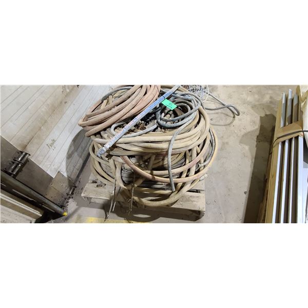 SKID OF ASSORTED AIR AIR HOSE AND 2" WATER HOSE LOCATED IN FORT MCMURRAY