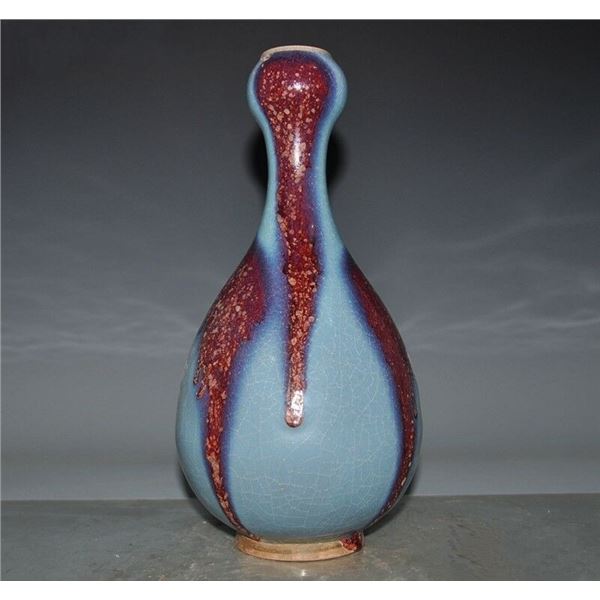 A PURPLE SPLASH JUN-KILN BOTTLE VASE QING DYNASTY.