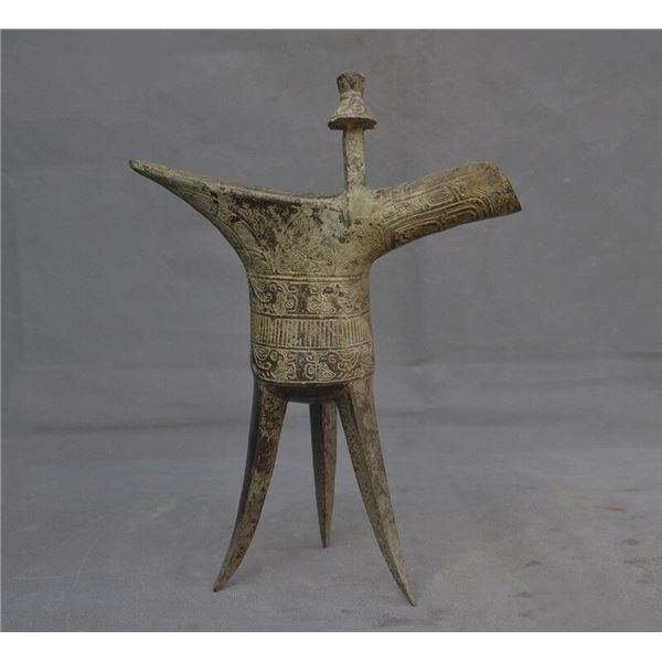 A BRONZE WINE CUP MING DYNASTY.